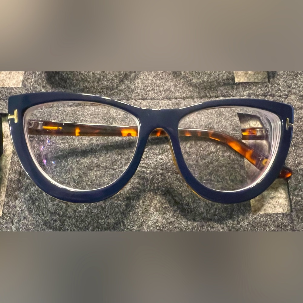 Blue and tortoise glasses